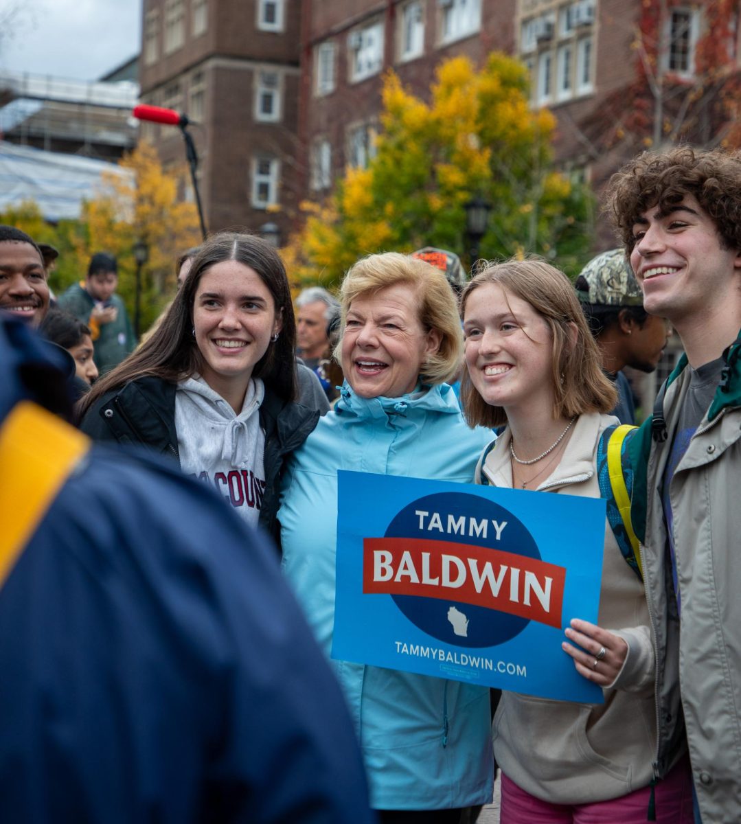 US Senator Tammy Baldwin Poses for a Picture with UW Students at Library Mall on Tuesday. 