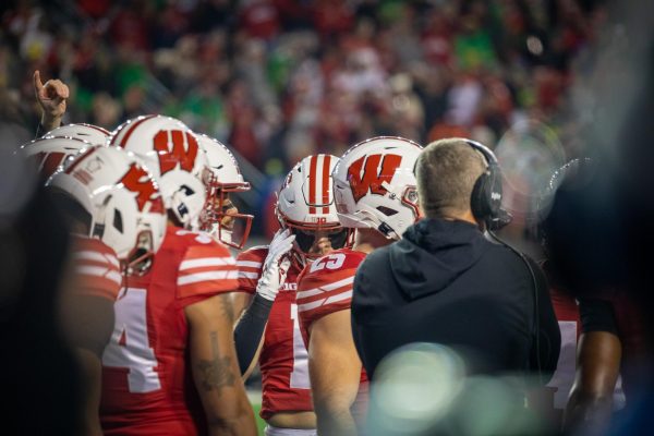 The Badgers huddling against Oregon. November 17, 2024. 