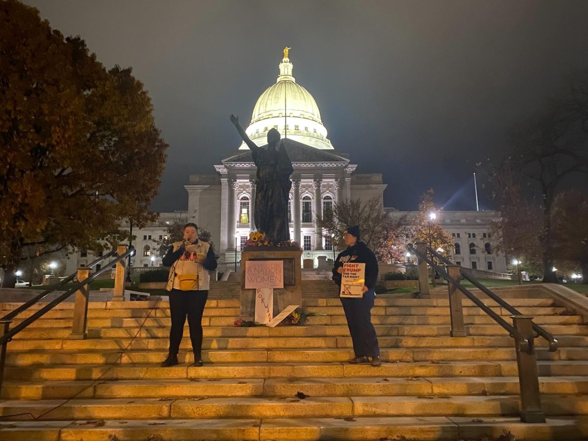 Organizers speak at the rally in front of the Capitol Building.