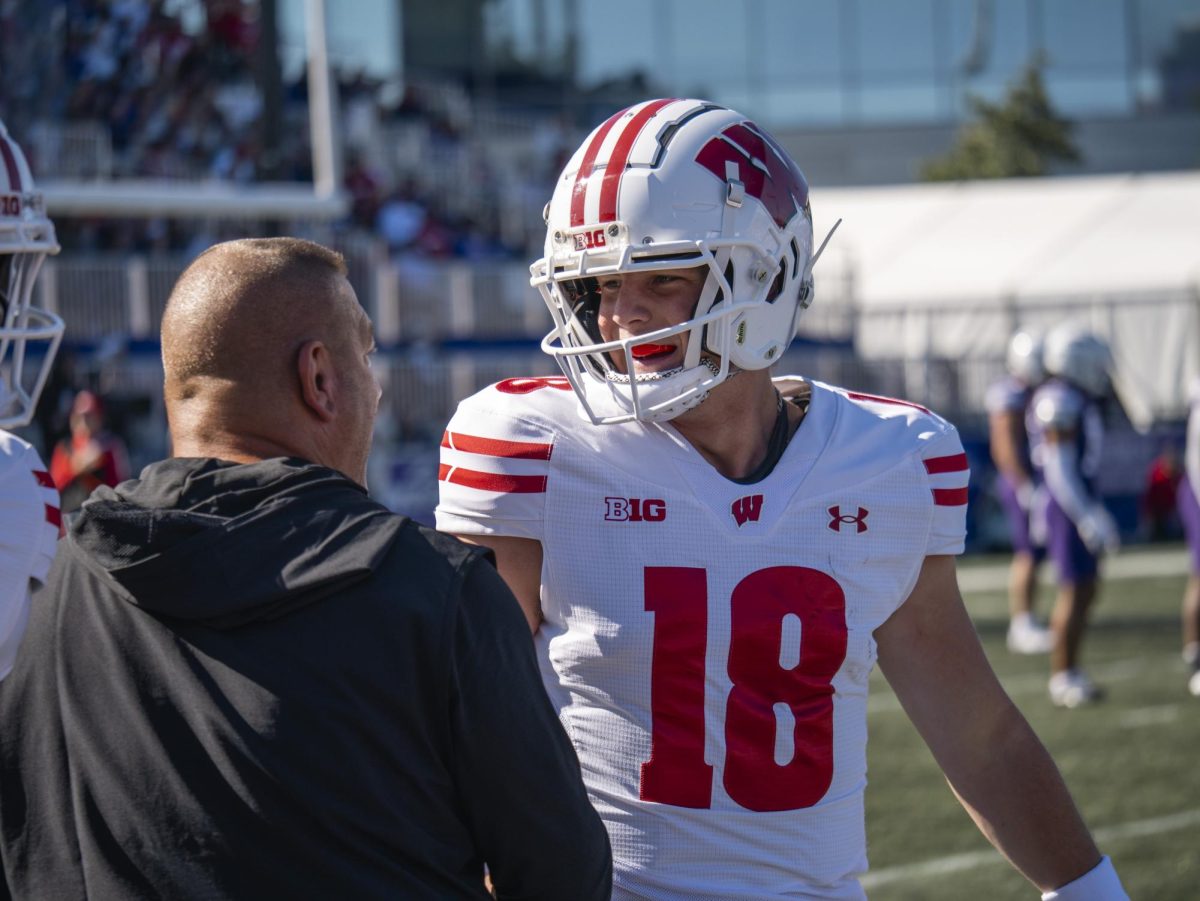 Now-fired offensive coordinator Phil Longo celebrates after quarterback Braedyn Locke performs well at Northwestern. October 19, 2024.  