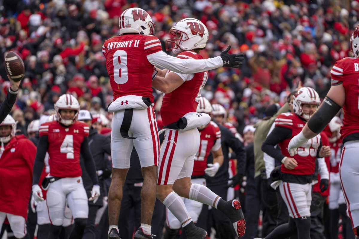 Anthony II and Locke jump in the air to celebrate the first and only touchdown of the game against Minnesota. November 29, 2024. 