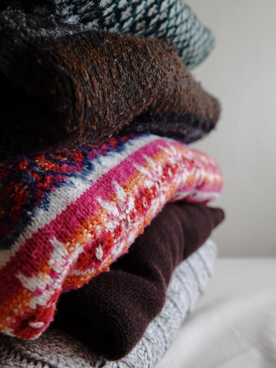 A stack of winter sweaters. December 7, 2024. 