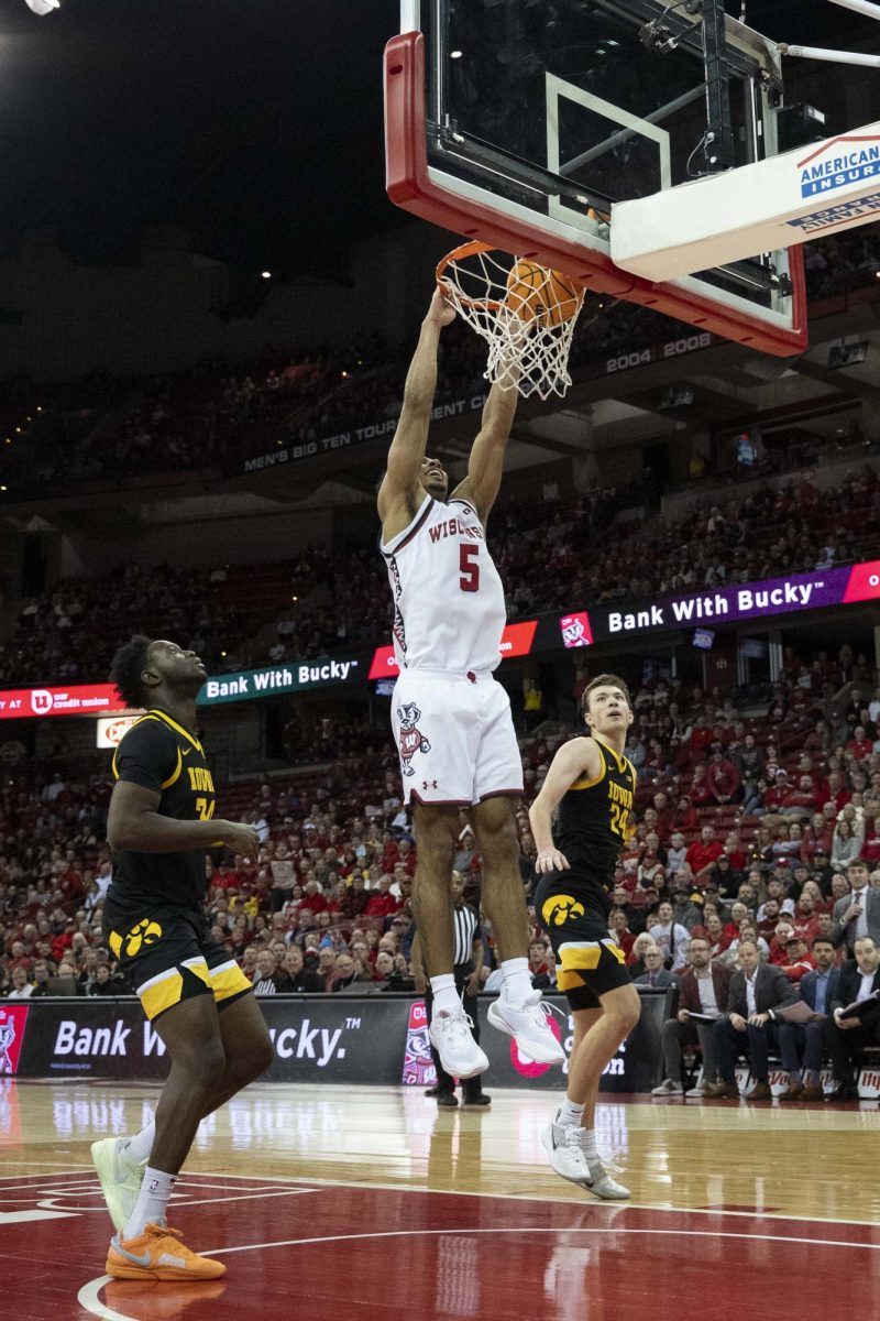 Badger player slam dunks against Iowa. January 3, 2025.