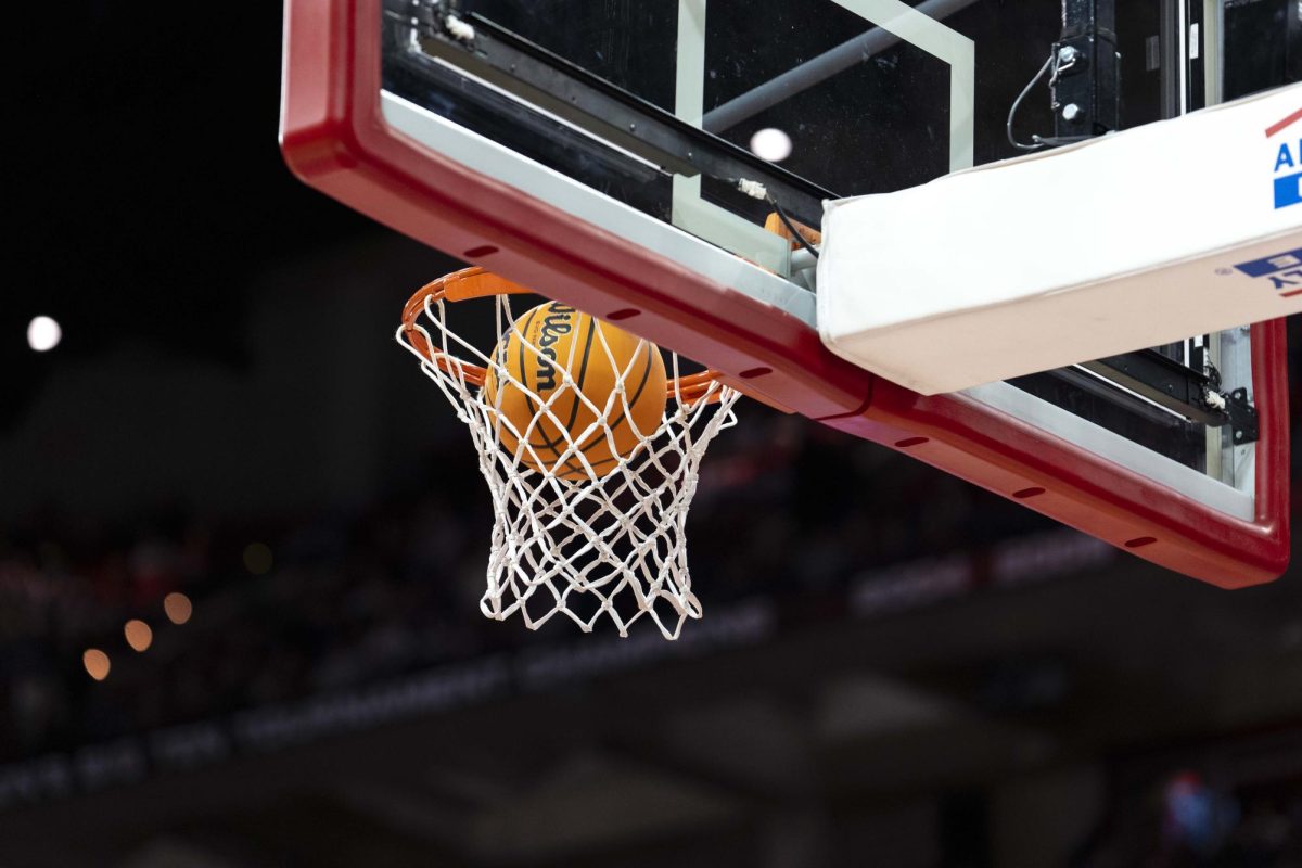 Basketball goes into the hoop at the Kohl Center during a game. January 3, 2025.  