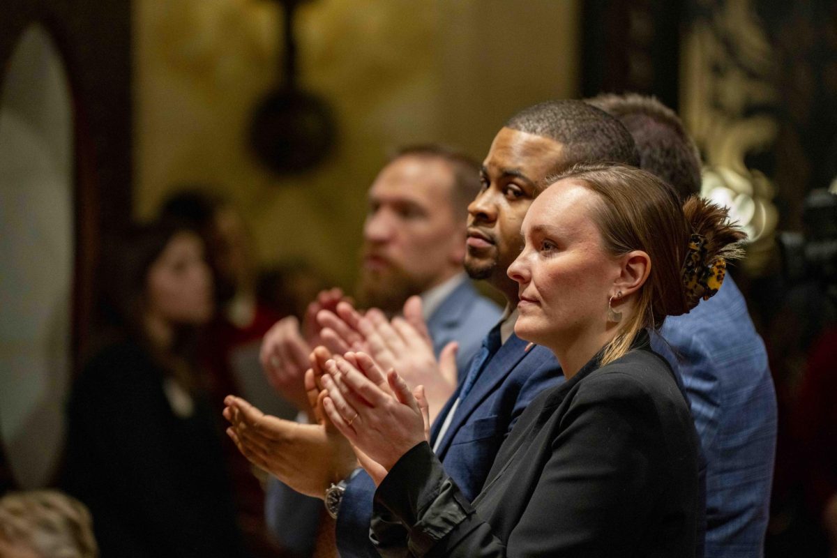 Democratic assembly Minority Leader, Representative Greta Neubauer claps for democratic governor Tony Evers. January 22, 2025.