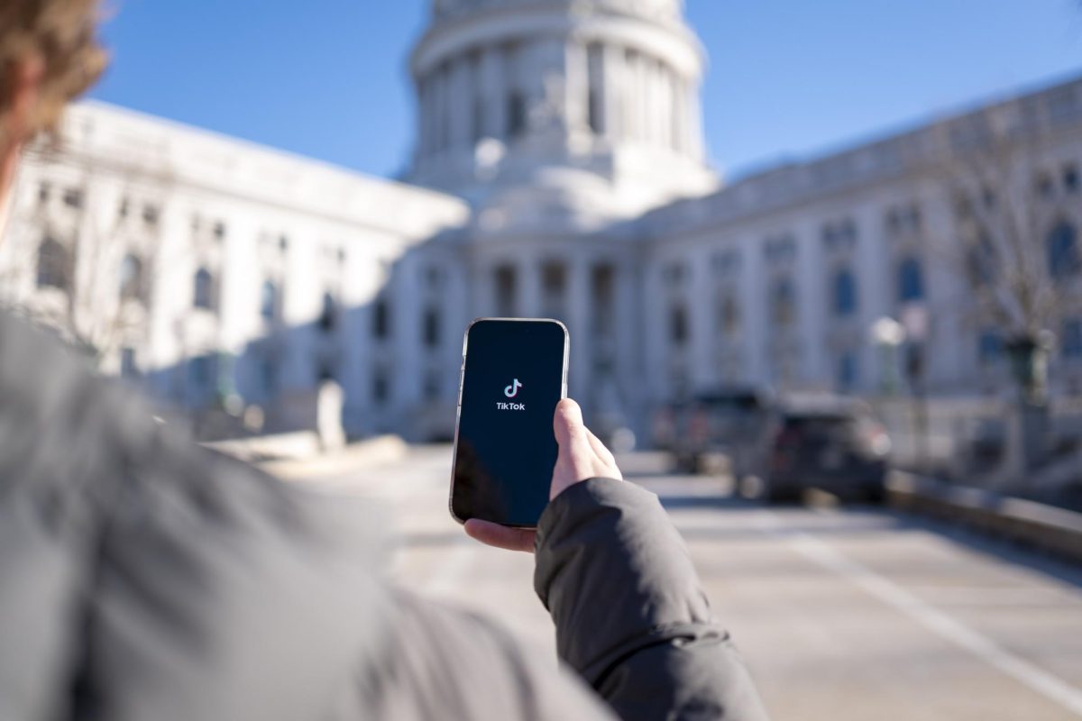 TikTok app open on phone in front of Wisconsin State Capitol. January 26, 2025.