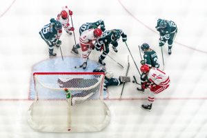 The UW Women's Hockey team battles for a goal against Michigan State. March 1, 2025.
