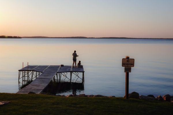 People fishing on Lake Mendota. April 27, 2025.