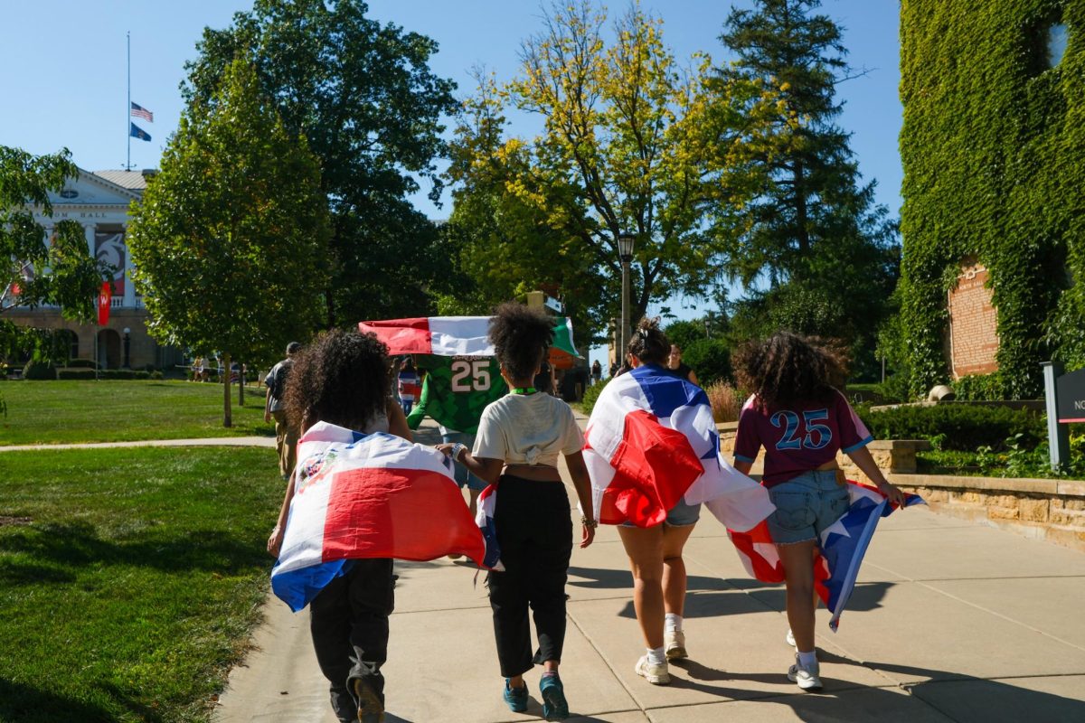 Students hold Latine cultural flags walking up Bascom Hill to kick off Latine Heritage month. September 12, 2025. 