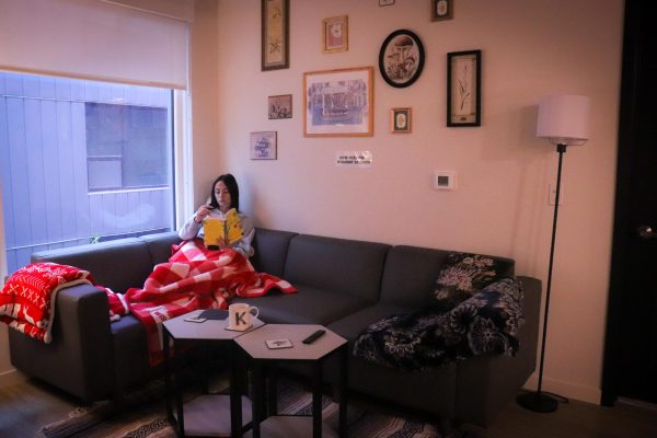 Student unwinds in their apartment. September 8, 2025. 