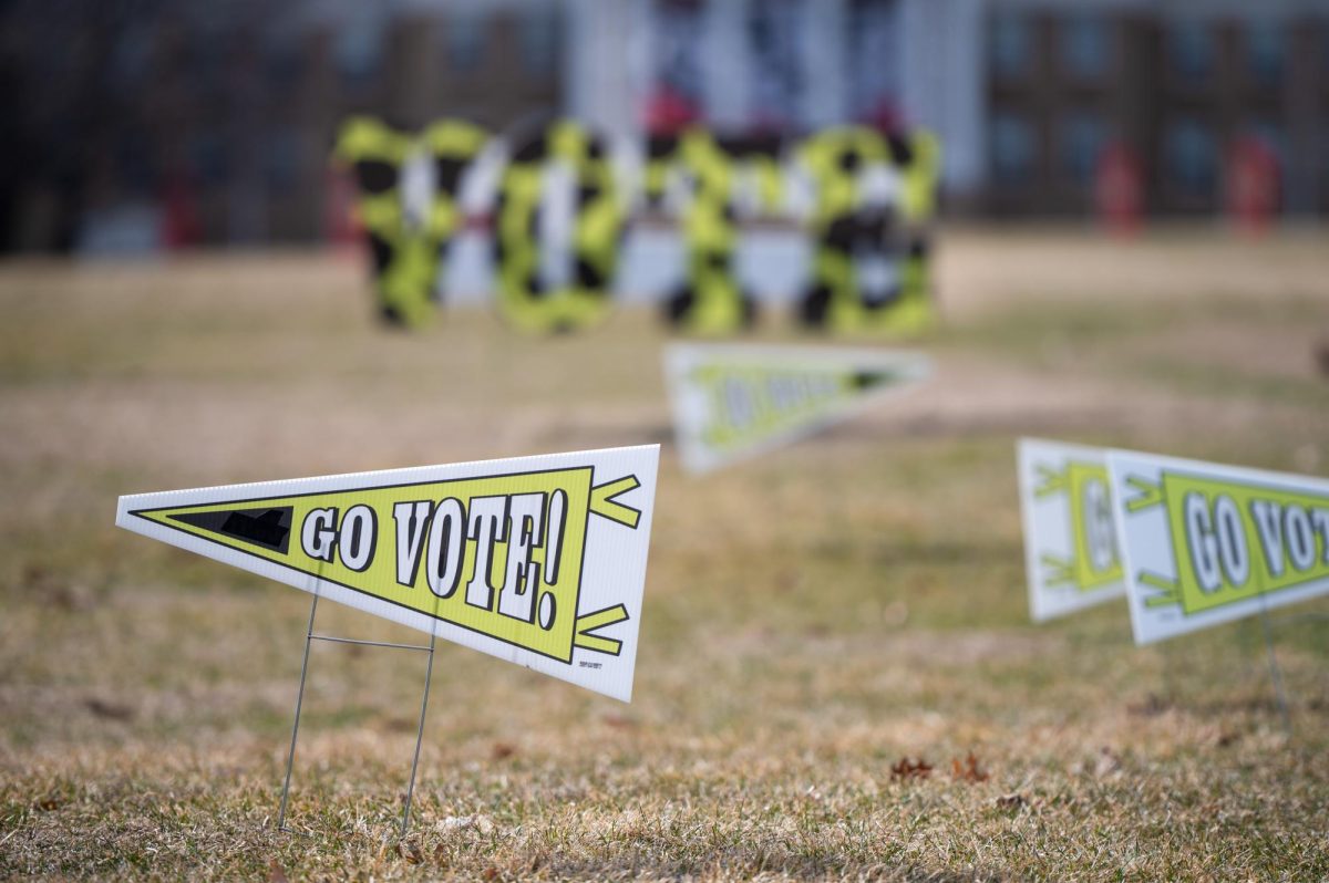 Signs on Bascom Hill encourage early voting for Wisconsin's April 7th election, which includes a race for state Supreme Court. March 24, 2026. 