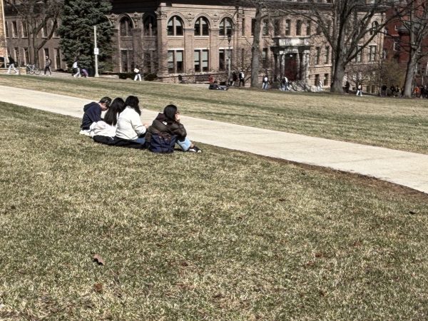 People studying outside on Bascom Hill. March 23, 2026